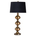 DIzajnová luxusná stolná lampa Perceiro s čiernym zamatovým tienidlom a zlatým členitým podstavcom zo živice