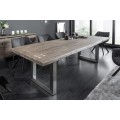 Dizajnový masívny jedálenský stôl Mammut sivohnedej farby z agátového dreva s kovovými nohami