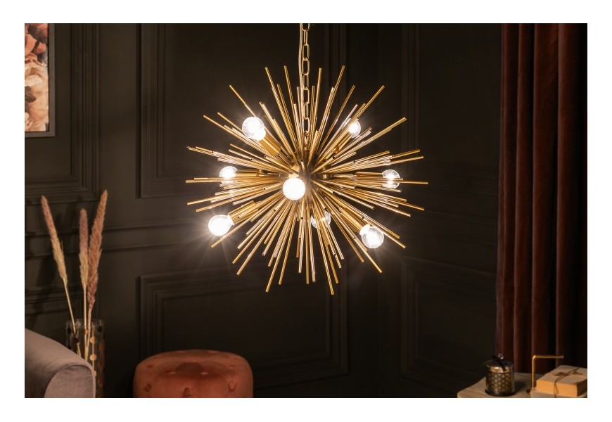 Štýlový art-deco luster Sunrise  z kovových lúčov v zlatej farbe