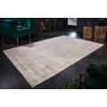 Elegantný vintage obdĺžnikový koberec Adassilv béžovej farbe s vypraným efektom