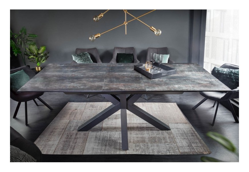 Dizajnový industriálny rozkladací jedálenský stôl Callandra tmavosivej farby z keramiky s čiernymi kovovými nohami