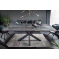 Dizajnový industriálny rozkladací jedálenský stôl Callandra tmavosivej farby z keramiky s čiernymi kovovými nohami