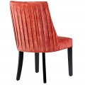 Dizajnová lososová jedálenská stolička Coral so zamatovým poťahom s elegantými čiernymi nohami z masívu a rebrovaným vzorom zo z