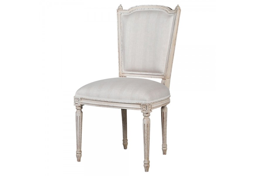 Baroková jedálenská stolička v bielej farbe z mahagónového dreva s vyrezávanými ozdobnými prvkami a čalúnením z bavlnenej látky