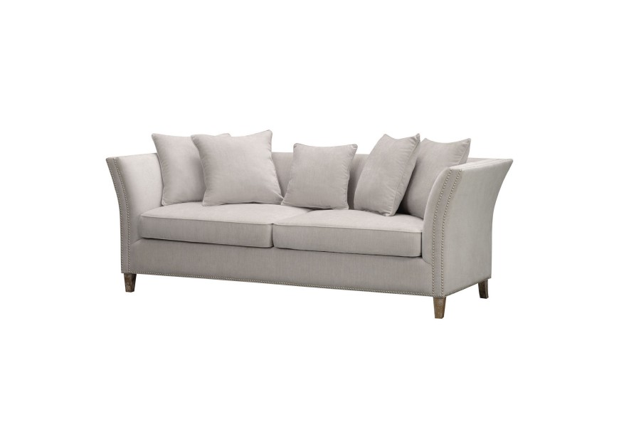 Modern&aacute; trojsedačka Arla v kr&eacute;movom čal&uacute;nen&iacute; so &scaron;t&yacute;lov&yacute;mi nožičkami 225cm