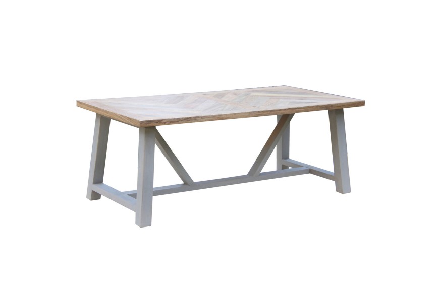 Jedálenský stôl Nyakim v škandinávskom štýle s povrchovo upravenou svetlo hnedou doskou a svetlými nožičkami pripomínajúcimi kov