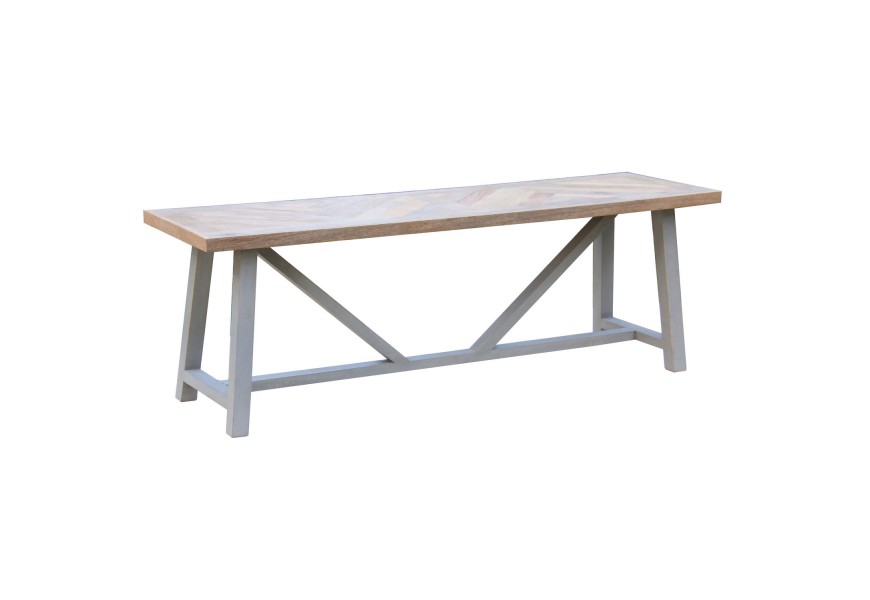 Dizajnová jedálenská lavica Nyakim z hnedého dreveného masívu a drevenými nožičkami s podstavou v tvare V