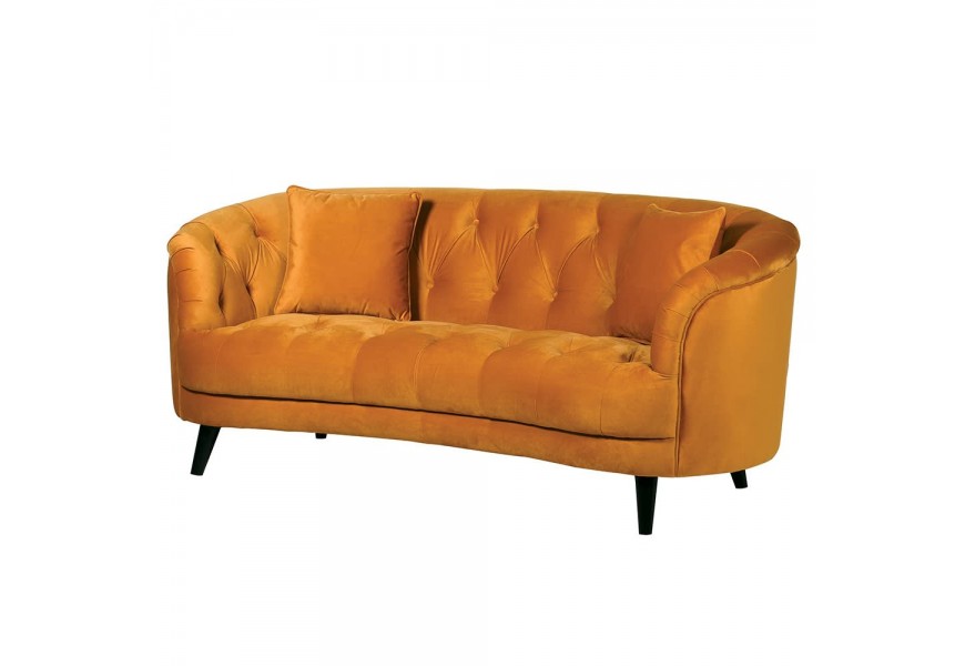 Sedačka Senapa s čiernymi nožičkami a zamatovým horčicovým čalúnením s gombíkovým prešívaním