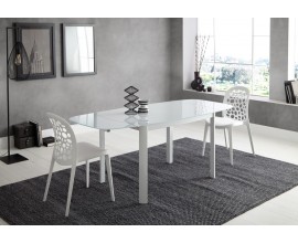 Moderný oválny rozkladací jedálenský stôl Loanne zo skla v lesklej bielej farbe 120(180)cm