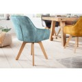 Škandinávske luxusné zamatové otočné jedálenské kreslo Caballet s opierkami na ruky a poťahom modrej farby 84cm