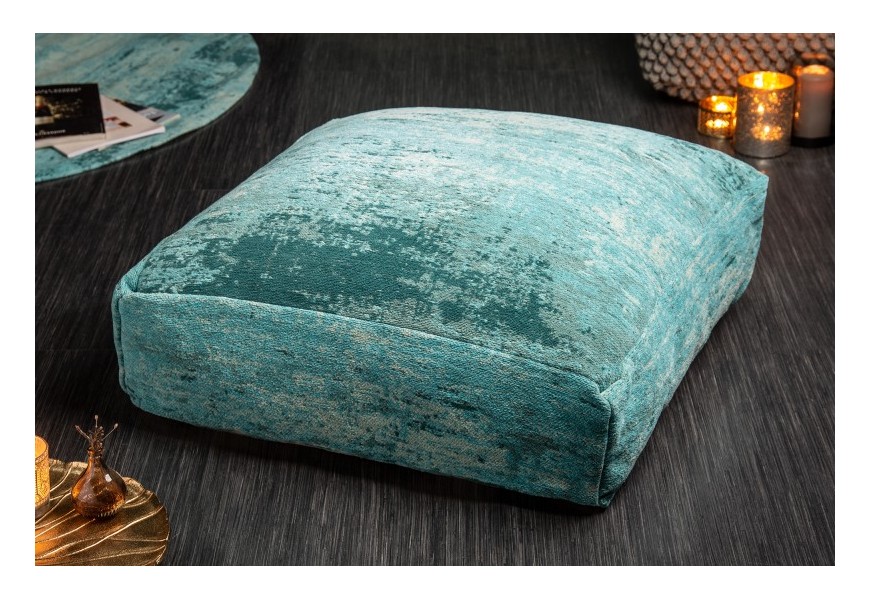 Moderný štvorcový podlahový vankúš Prakka so vzorovaným tyrkysovým čalúnením