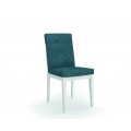 Dizajnová jedálenská stolička Cerdena s modrým poťahom a bielymi masívnymi nohami