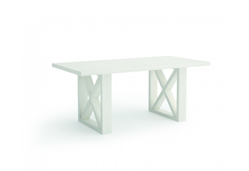 Luxusný masívny jedálenský stôl v bielej farbe s prekríženými nohami