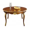 Masívny rozkladací jedálenský stôl Pasiones v okrúhlom tvare so zlatými kovovými ozdobami