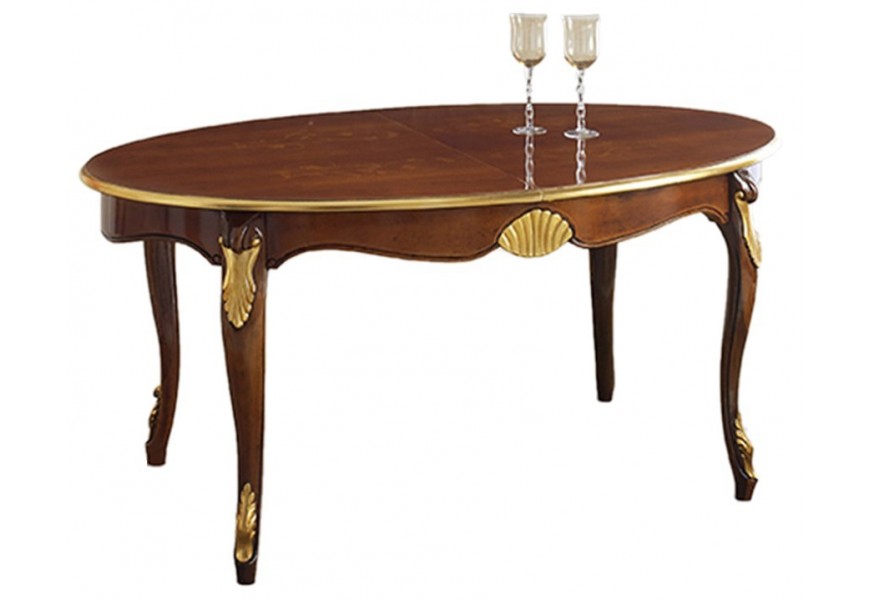 Jedinečný oválny jedálenský stôl Pasiones z masívneho dreva so zlatými kovovými prvkami