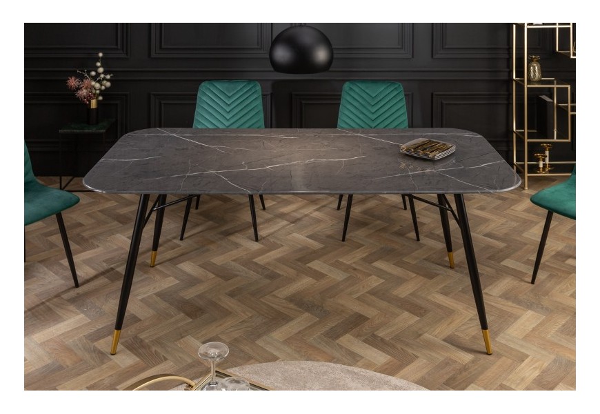 Vkusný art-deco mramorový jedálenský stôl Forisma v čiernom prevedení s nohami z kovu so zlatými prvkami