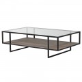 Sklenený konferenčný stolík Diveni Black so sklenenou doskou s čiernou kovovou konštrukciou a strednou ratanovou doskou.
