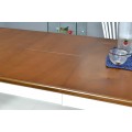 Provensálsky rozkladací jedálenský stôl Felicita z dreva hnedo-bielej farby s vyrezávanými nohami 150-194cm