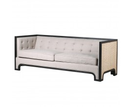 Luxusná trojsedačka Zenith v art-deco štýle so sivým čalúnením s kovovým rámom čiernej farby a ratanovým výpletom