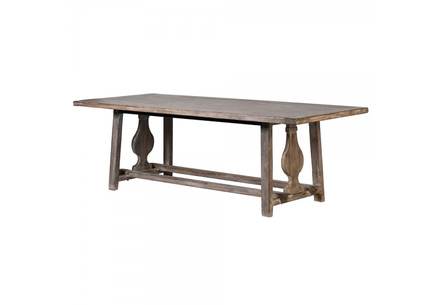 Masívny vidiecky jedálenský stôl Merlin v tvare obdĺžnika v hnedom prevedení s ošúchaným bielym a tyrkysovým náterom s vretenovitými oporami