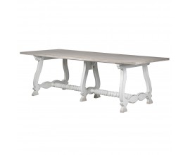 Masívny off-white biely dlhý jedálenský stôl Harrold z borovicového a brezového dreva v rustikálnom štýle s ornamentálnymi noh