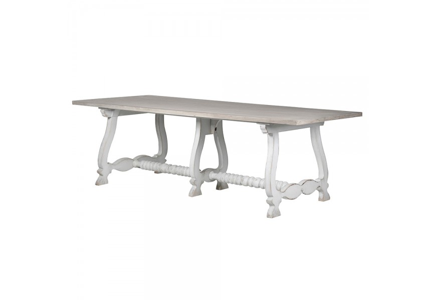 Masívny off-white biely dlhý jedálenský stôl Harrold z borovicového a brezového dreva v rustikálnom štýle s ornamentálnymi noh