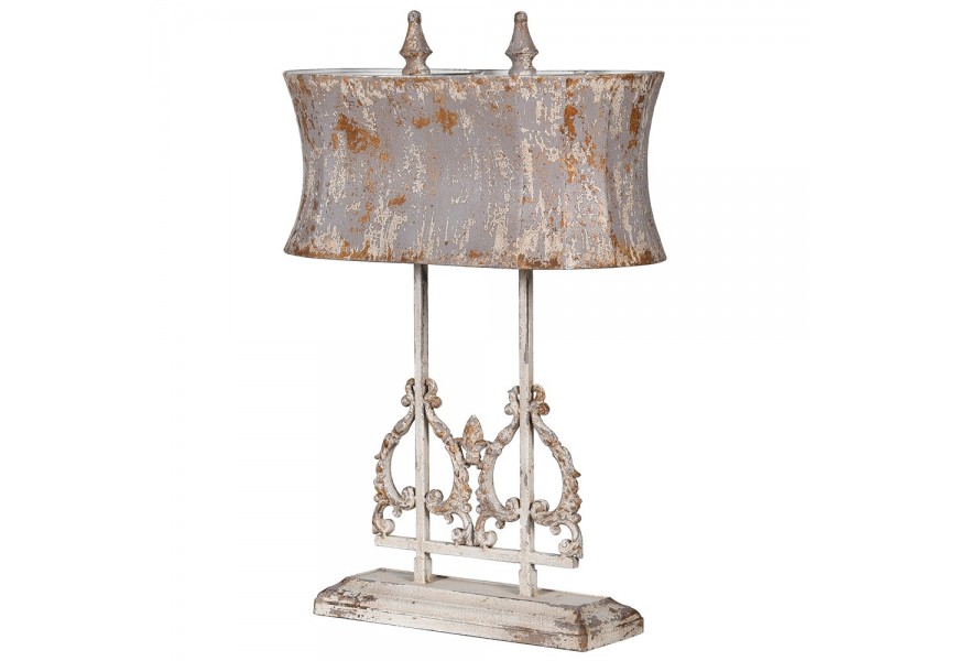 Starožitne pôsobiaca ornamentálne zdobená oválna lampa Silvertongue s obdĺžnikovou podstavou šedej holubičej a slonovinovej bielej farby vo vintage štýle