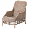 Masívne pohodlné ratanové kreslo Ratana na nožičkách v hnedej kapučínovej farbe s opierkami na ruky a hustým ručne pleteným ratanovým výpletom
