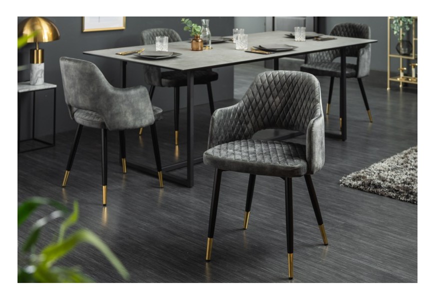 Art-deco stolička Fribourg so sivým zamatovým poťahom a čierno-zlatými nohami