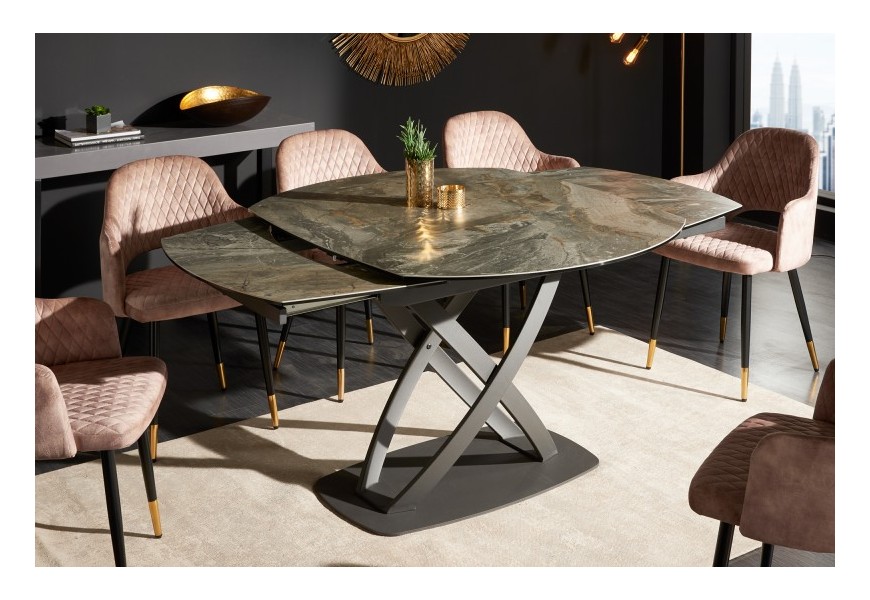 Moderný industriálny jedálenský stôl Lutz II s kovovou čiernou konštrukciou a prekríženými nožičkami a vrchnou keramickou mramorovou oválnou doskou