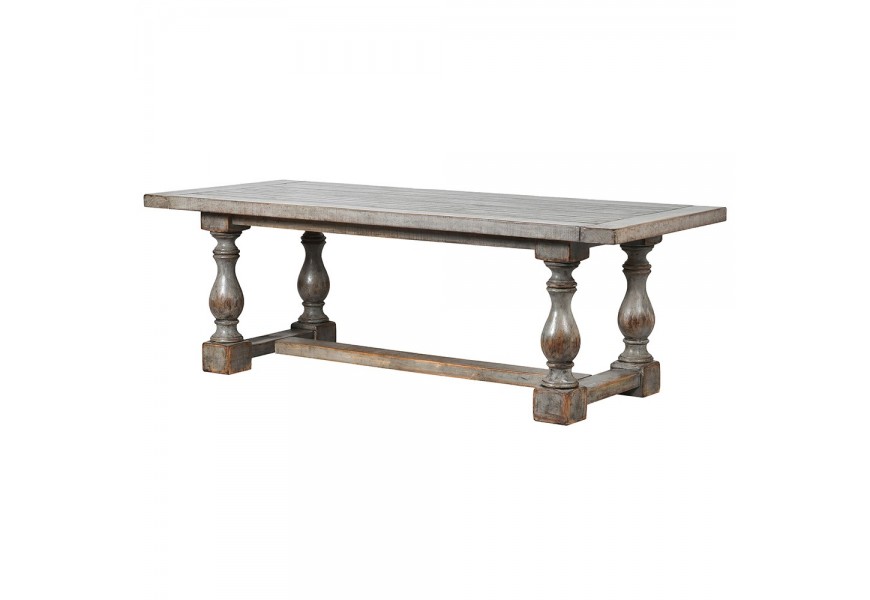 Vyrezávaný rustikálny jedálenský stôl Teulada z masívneho dreva s prírodnou hnedou povrchovou úpravou