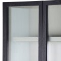 Moderná dizajnová vitrína Kaleon z masívneho dreva čiernej farby s dvierkami z ryhovaného skla 211cm