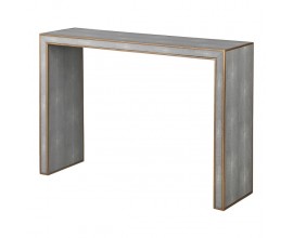 Moderný luxusný konzolový stolík Otawa sivej farby s poťahom zo šagrénovej ekokože a zdobením zlatej farby 120cm 