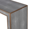 Moderný luxusný konzolový stolík Otawa sivej farby s poťahom zo šagrénovej ekokože a zdobením zlatej farby 120cm 