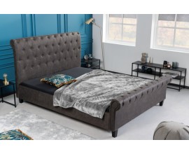 Moderná manželská posteľ Gambino s tmavosivým Chesterfield čalúnením a čiernymi drevenými nožičkami 225cm