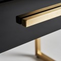 Moderný čierny nočný stolík Flara v sklenenom art-deco vyhotovení so zásuvkou a kovovými nožičkami v zlatej farbe 51cm
