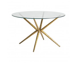 Luxusný Art-Deco okrúhly jedálenský stôl Sursee s prekríženými zlatými nožičkami a sklenenou vrchnou doskou 121cm