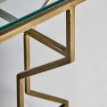 Art-deco luxusný príručný stolík Amuny so železnou tvarovanou konštrukciou v zlatej farbe a sklenenou doskou 60cm