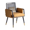 Glamour dizajnová stolička Brilon so zaamtovým žltým čalúnením a čiernou drevenou konštrukciou