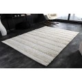 Slonovinový obdĺžnikový koberec Lamby zo 100% bavlny a pretkávaním v pásoch v štýle etno