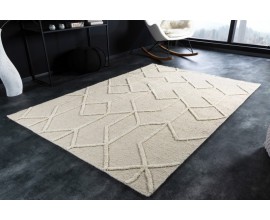 Elegantný obdĺžnikový koberec Monami s vlneným povrchom slonovinovej farby s jemným geometrickým vzorom