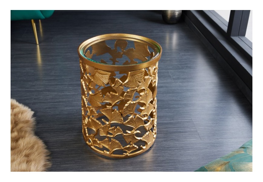 Elegantný art deco príručný stolík Ginko v zlatom prevedení z kovu so sklenenou povrchovou doskou okrúhleho tvaru