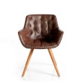 Dizajnové prešívanie eko-koženého čalúnenia stoličky Vita Naturale s gombíkmi