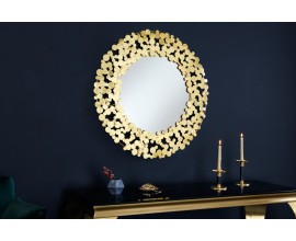 Art deco závesné zrkadlo Flovia okrúhleho tvaru so zlatým kovovým rámom vytvoreným z okrúhlych lupeňov 82cm