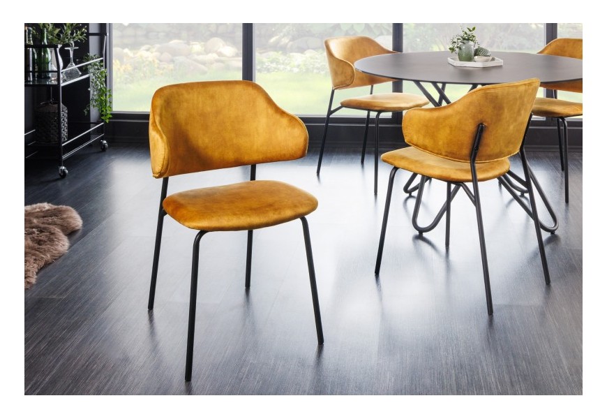 Moderná žltá jedálenská stolička Mildred s poťahom zo zamatu a s čiernou kovovou konštrukciou