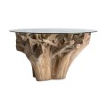 Štýlový etno okrúhly jedálenský stôl Haruku s prírodnou podstavou z teakového masívu a sklenenou vrchnou doskou