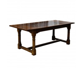 Masívny rustikálny jedálenský stôl Terrel z dubového dreva v hnedej farbe s lesklým povrchom 198cm