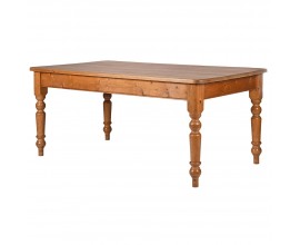 Masívny vidiecky jedálenský stôl Freggo z borovicového dreva s vyrezávanými nohami v svetlohnedom prevedení 180cm