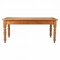 Vidiecky masívny jedálenský stôl Freggo z borovicového dreva s vyrezávanými nohami v svetlohnedom prevedení