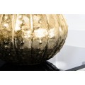 Glamour zlatá tepaná stolná lampa Redesia okrúhleho tvaru s čiernym tienidlom z textílie